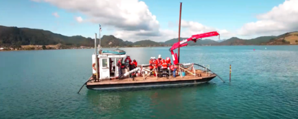 Boat with cabling equipment on water