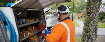 Image of a Downer Employee with a Utilities Truck